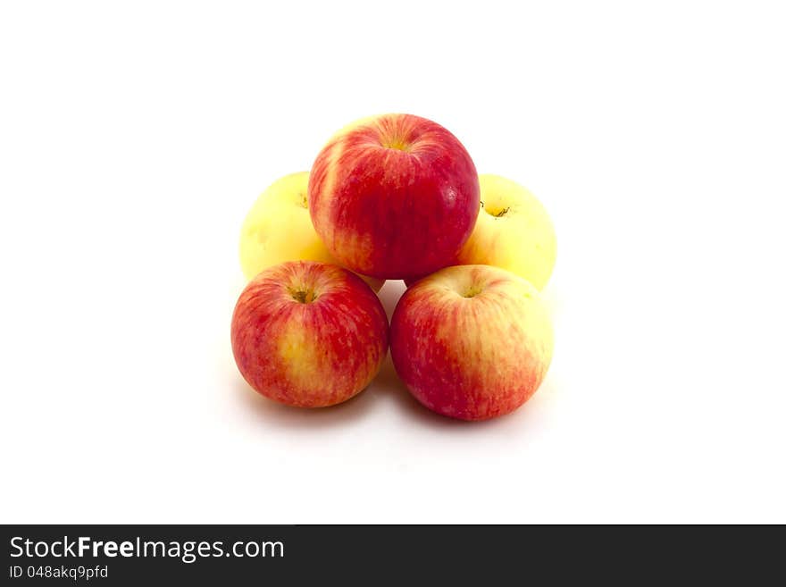 Five apples isolated on a white background.