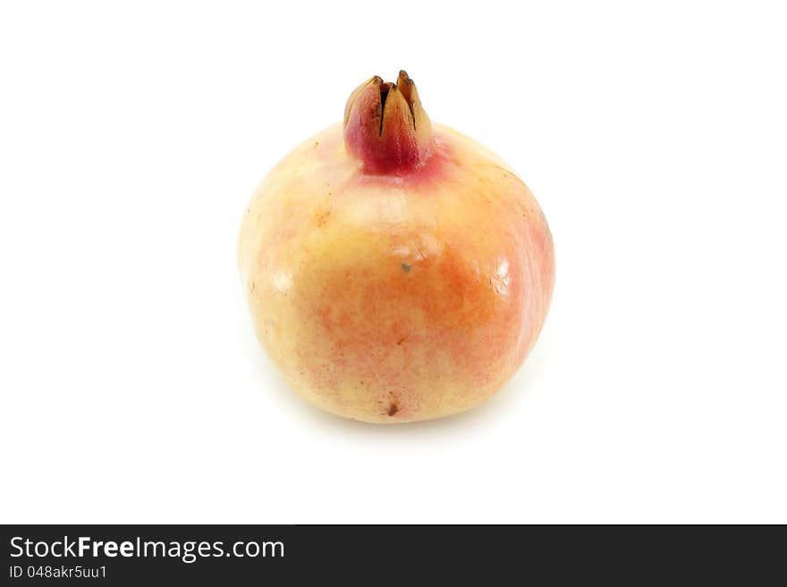 Single Pomegranate Isolated on white background.