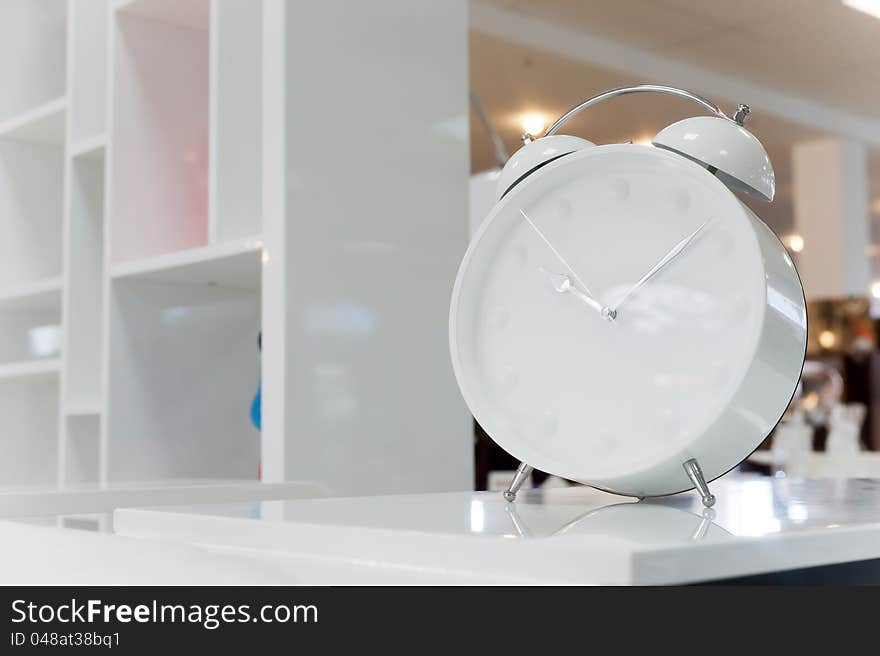 Photos of beautiful white classic alarm clock. Photos of beautiful white classic alarm clock