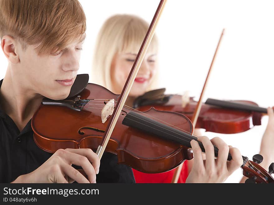 Image of musicians playing violins