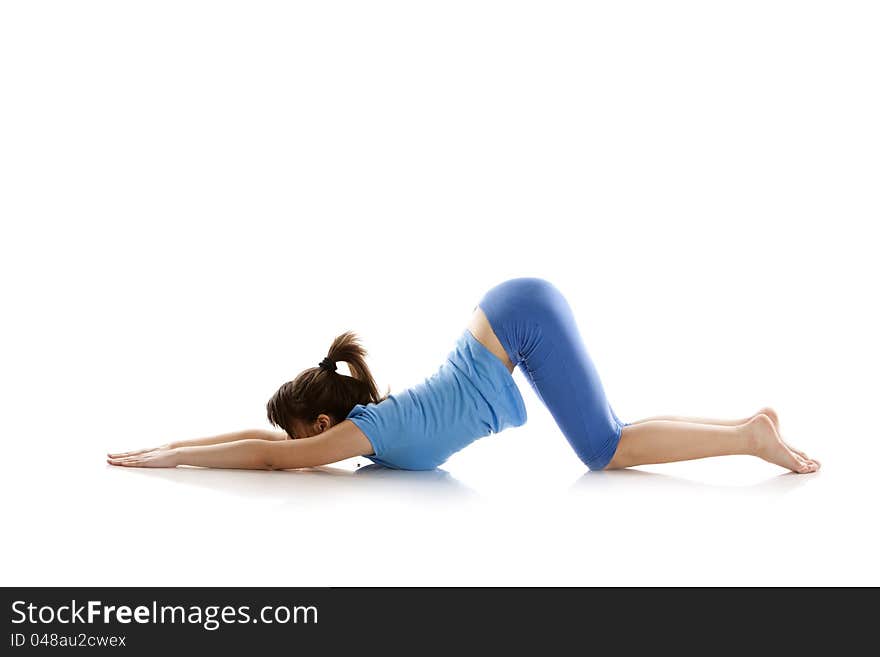 Image of a girl practicing yoga on white