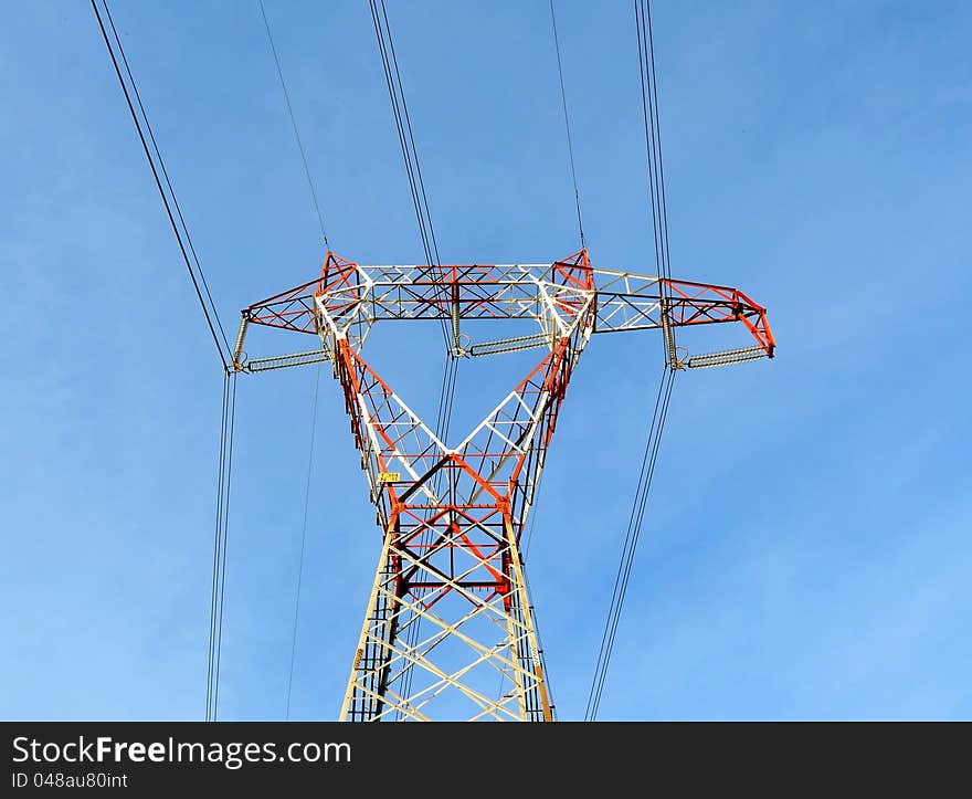 Power line pylon and blue sky