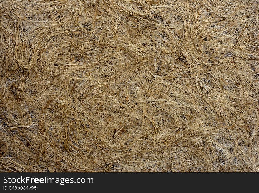 Closed up brown mulberry paper with wood pulp background.