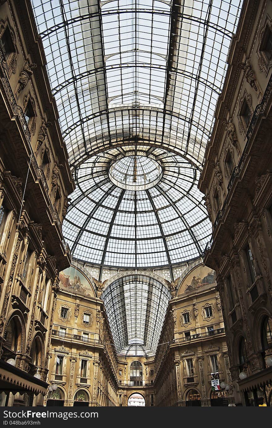 Interior shot of the imposing dome of the Vittorio Emanuele II gallery in Milan, Italy. Interior shot of the imposing dome of the Vittorio Emanuele II gallery in Milan, Italy.