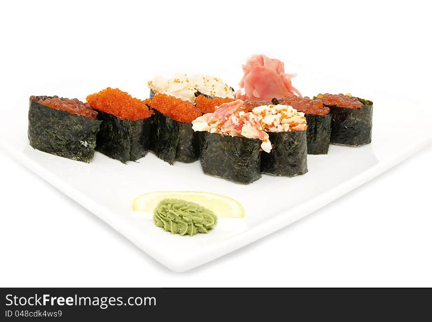 Japanese sushi on a plate on a white background