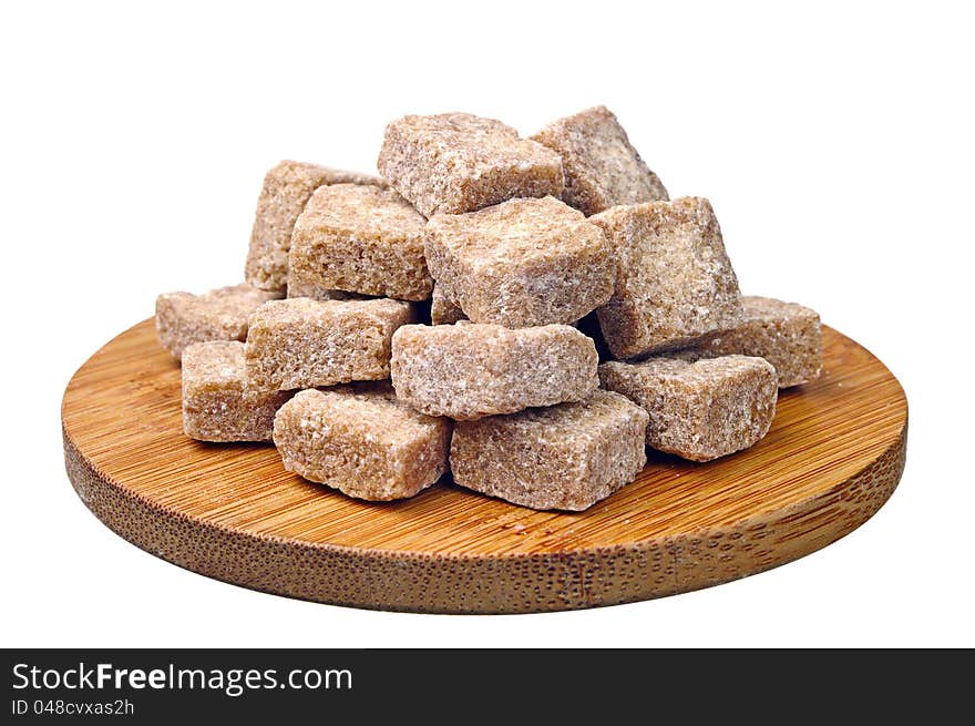 Cubes of brown cane sugar