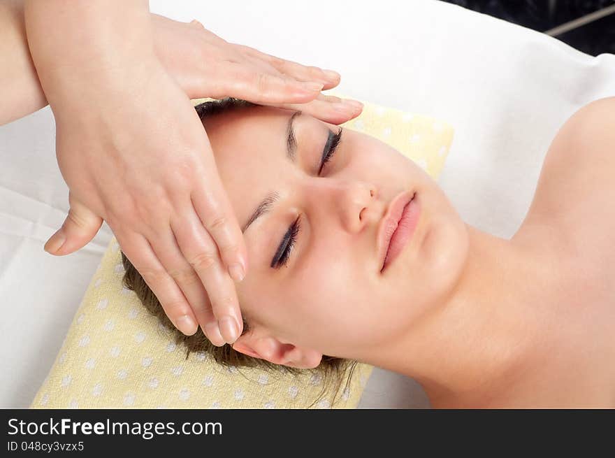 Beautiful young women getting a face massage