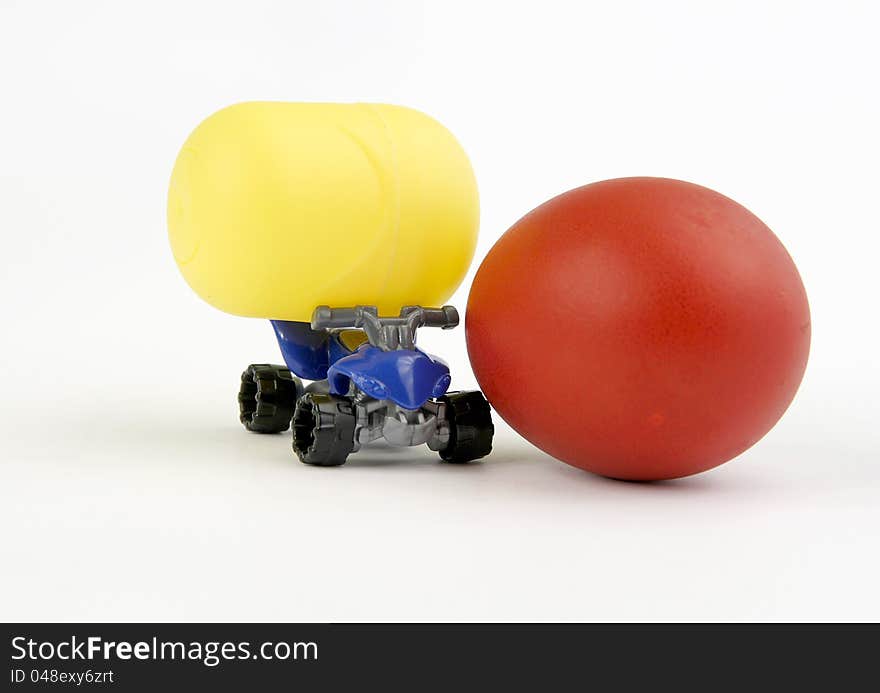 Real egg versus plastic toy. Real egg versus plastic toy