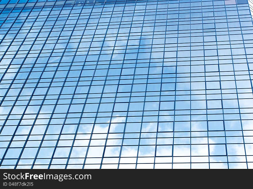 Blue sky reflection on modern building