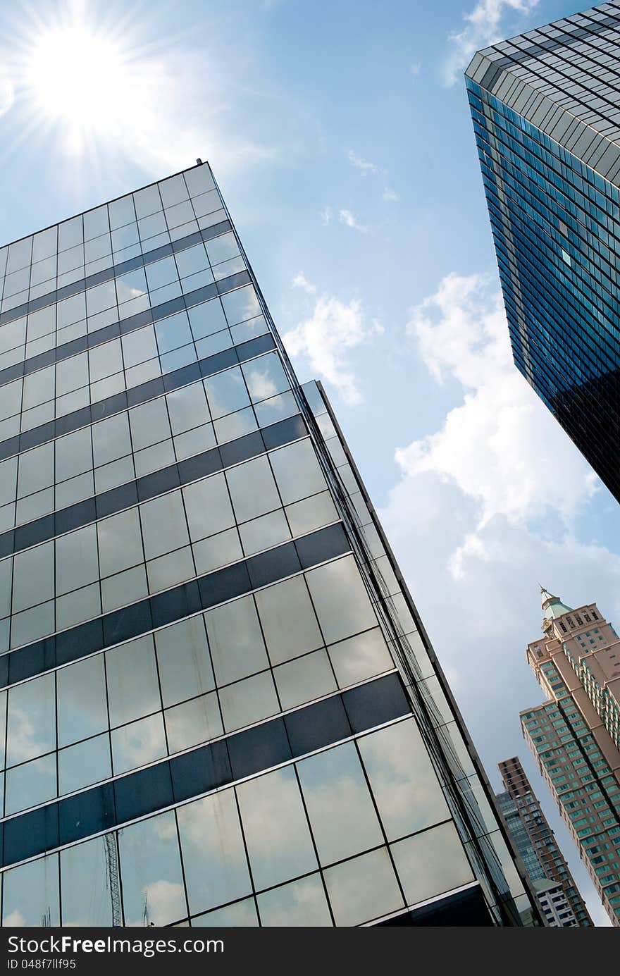 Blue sky reflection on modern building