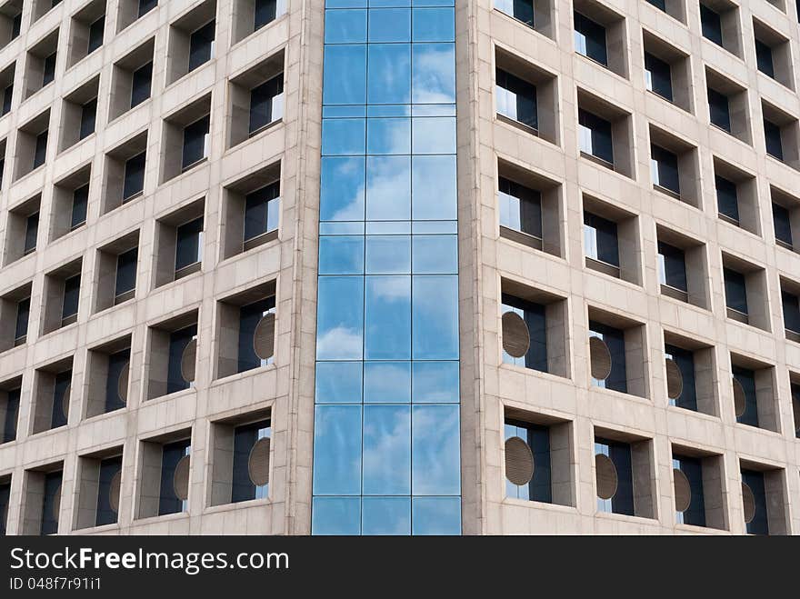 Blue sky reflection on modern building