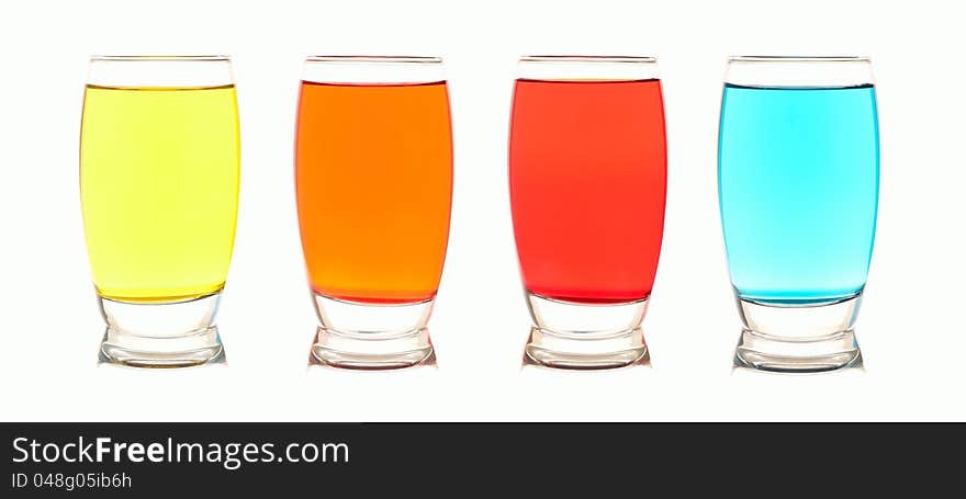 Four glasses each with a different color