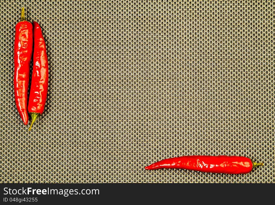 Red Hot Pepper On A Beige Background