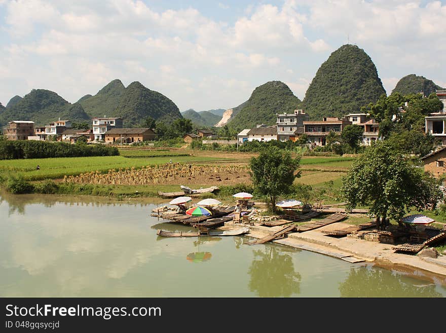 Beautiful Chinese landscape of Yangshuo with river and water meadows. Beautiful Chinese landscape of Yangshuo with river and water meadows