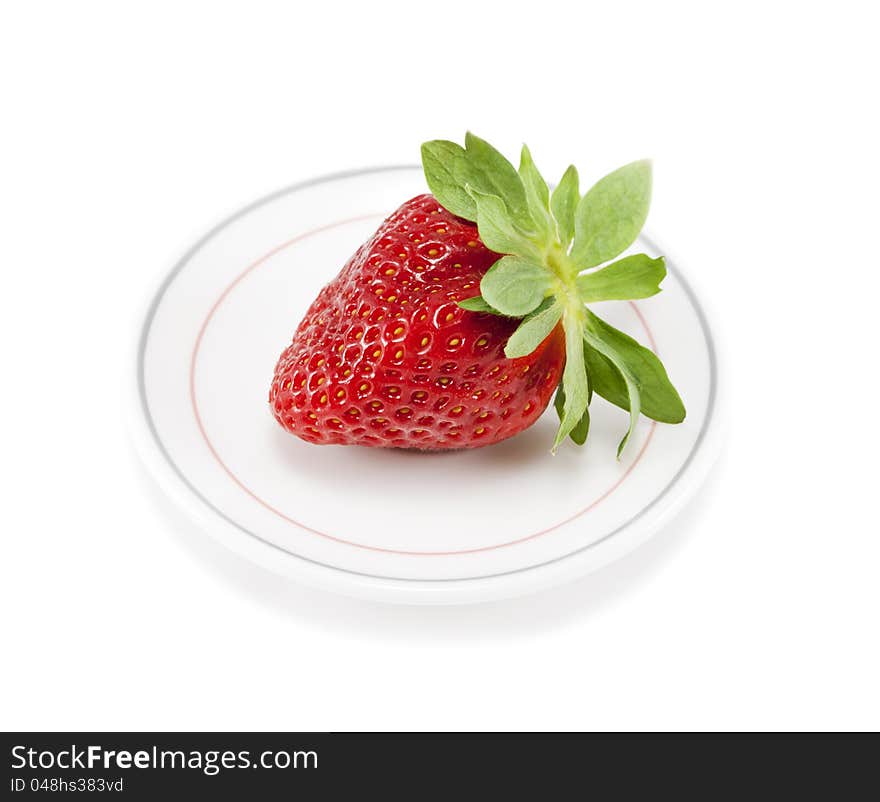 Strawberries on a plate on white  background