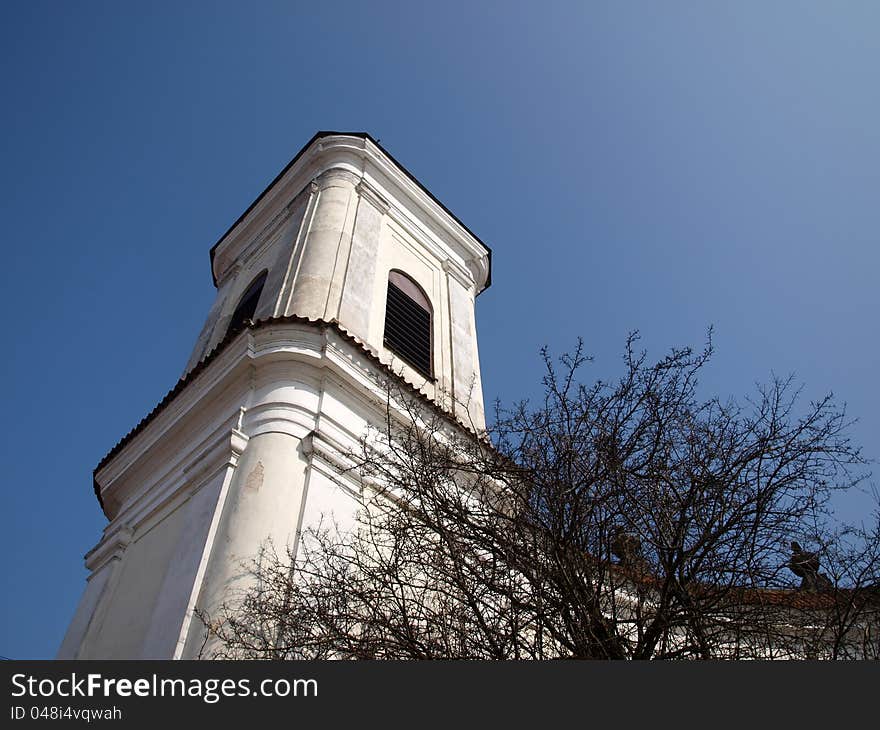 Tykocin market place with church and monument. Tykocin market place with church and monument