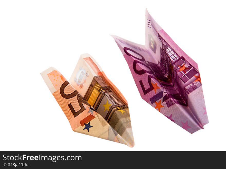 Paper planes from money advantage 50 and 500 on a white background