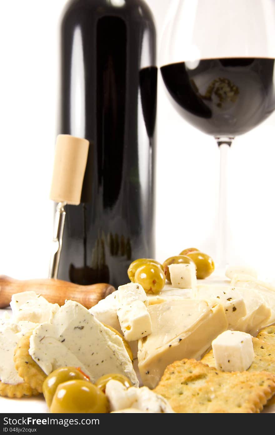 Picture of red wine, crackers, cheese and olives. Picture of red wine, crackers, cheese and olives