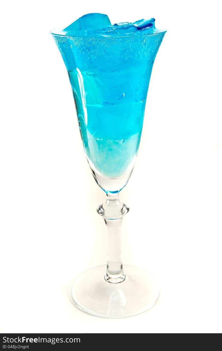 Wine glass with blue iceubes