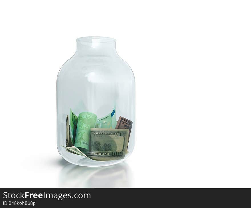 Glass jar filled with money on white background. Glass jar filled with money on white background.