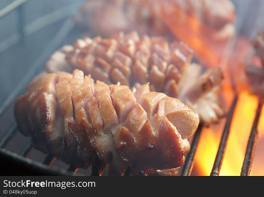 Barbeque grill with sausages