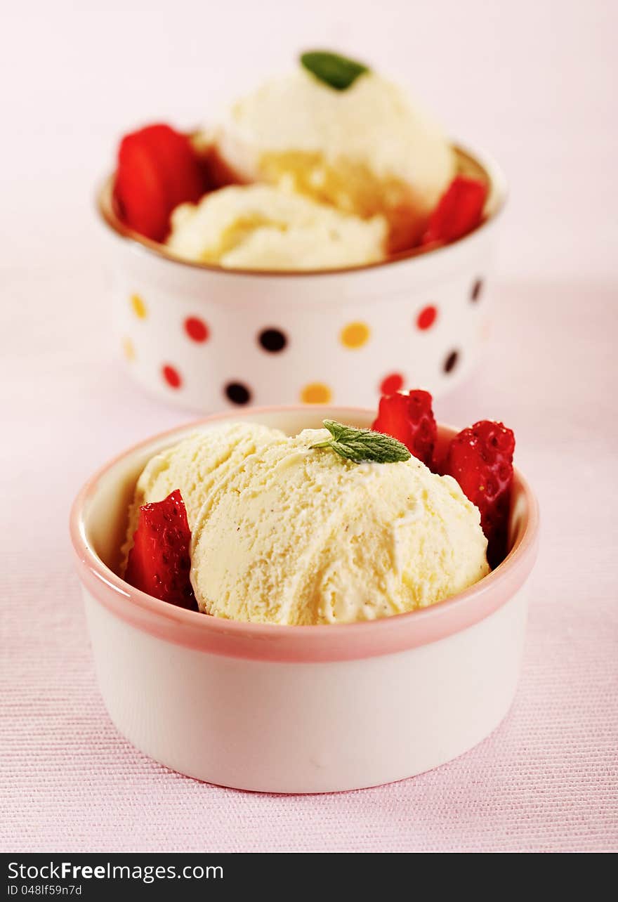 Strawberry ice cream with fruits close up