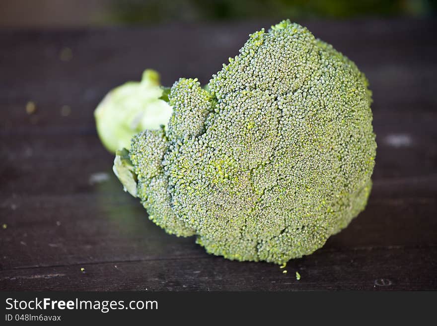 Fresh green broccoli on a wooden table. Fresh green broccoli on a wooden table