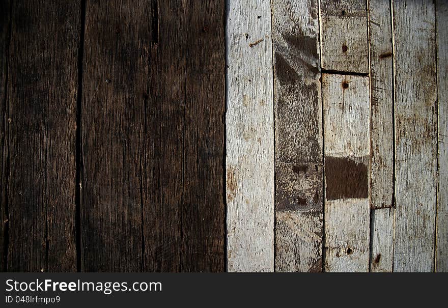 The different colour wood of table.