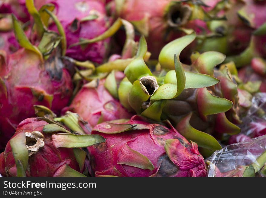 Group of fresh dragonfruits on a market