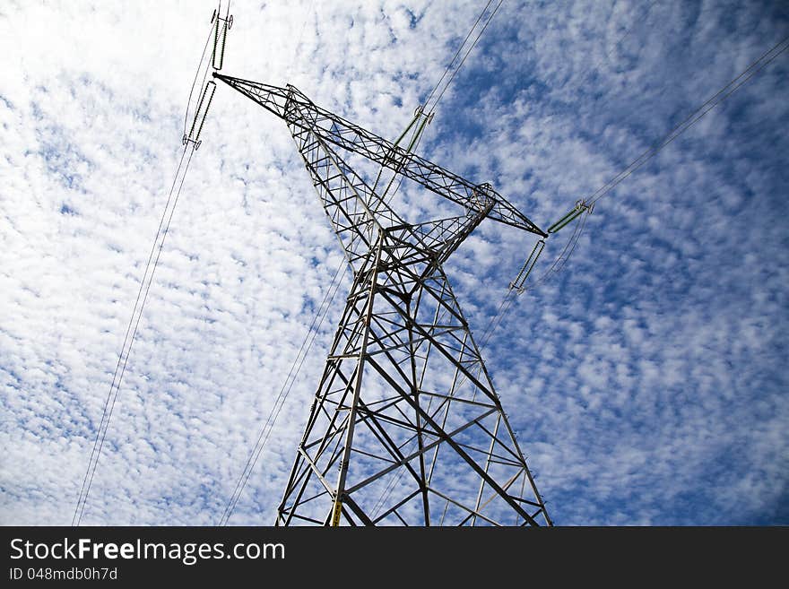 High voltage electric power transmission tower with cables. High voltage electric power transmission tower with cables