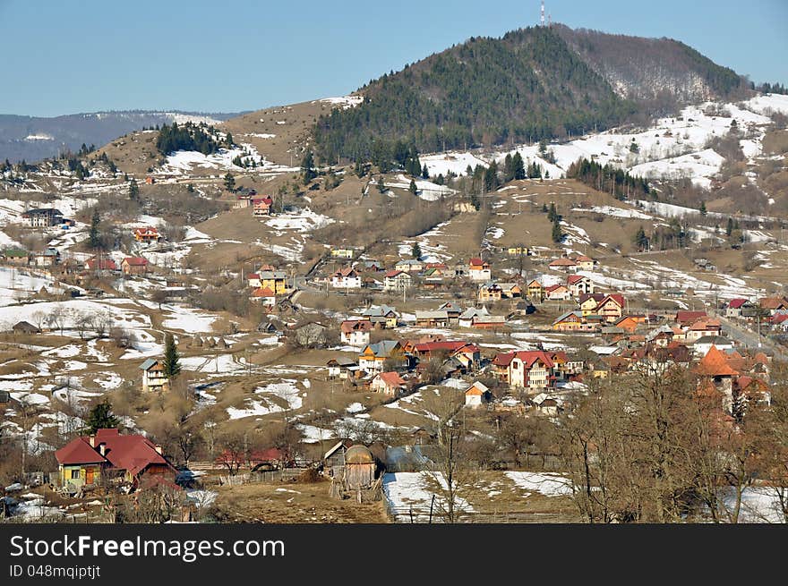 Village view through high mountain on Rucar-Bran pass in middle Romania. Village view through high mountain on Rucar-Bran pass in middle Romania