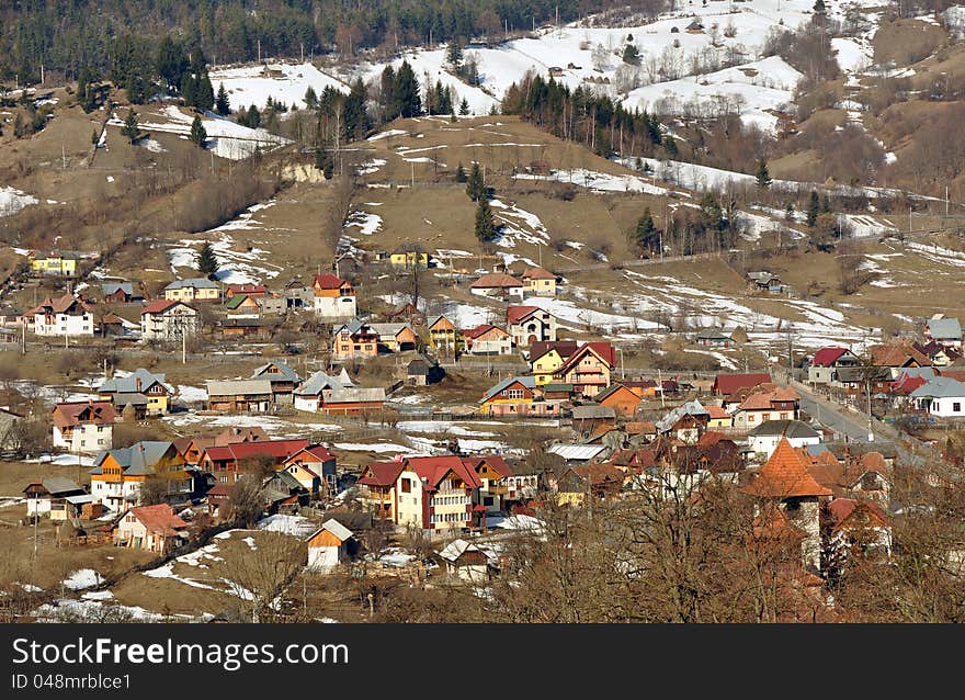 Village view through high mountain on Rucar-Bran pass in middle Romania. Village view through high mountain on Rucar-Bran pass in middle Romania