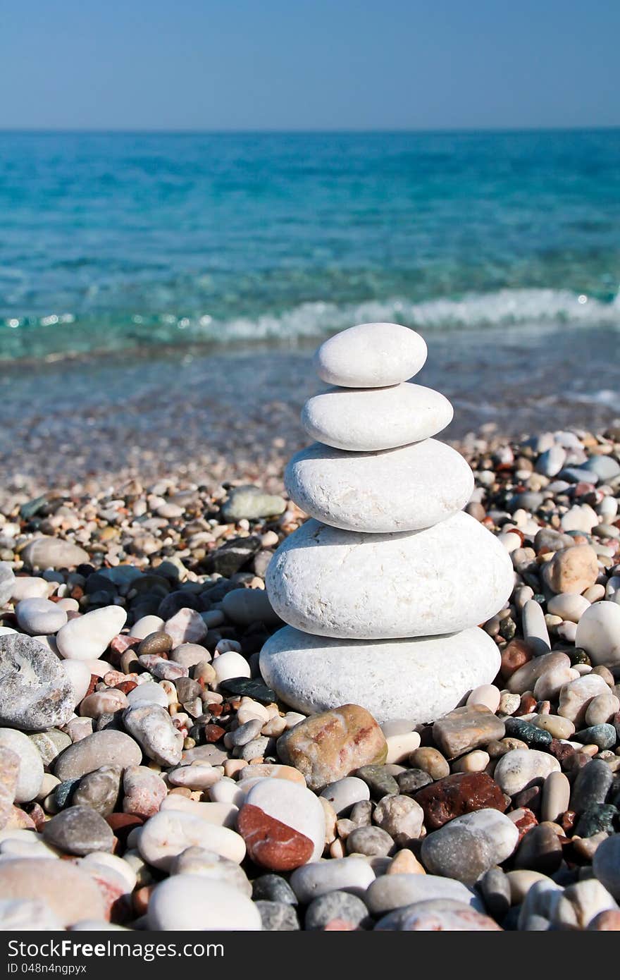 Stone pyramid on the beach