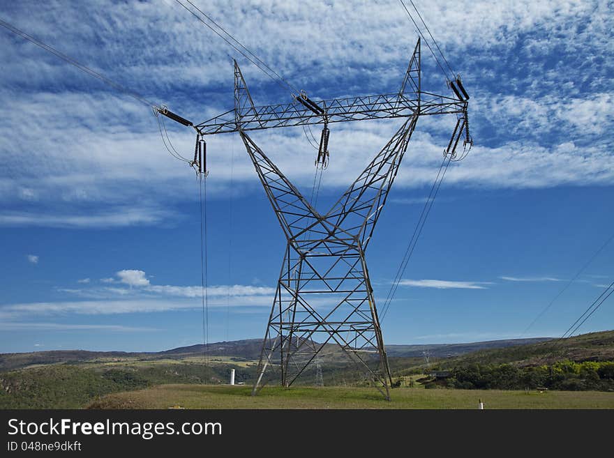 High voltage electric power transmission tower with cables. High voltage electric power transmission tower with cables