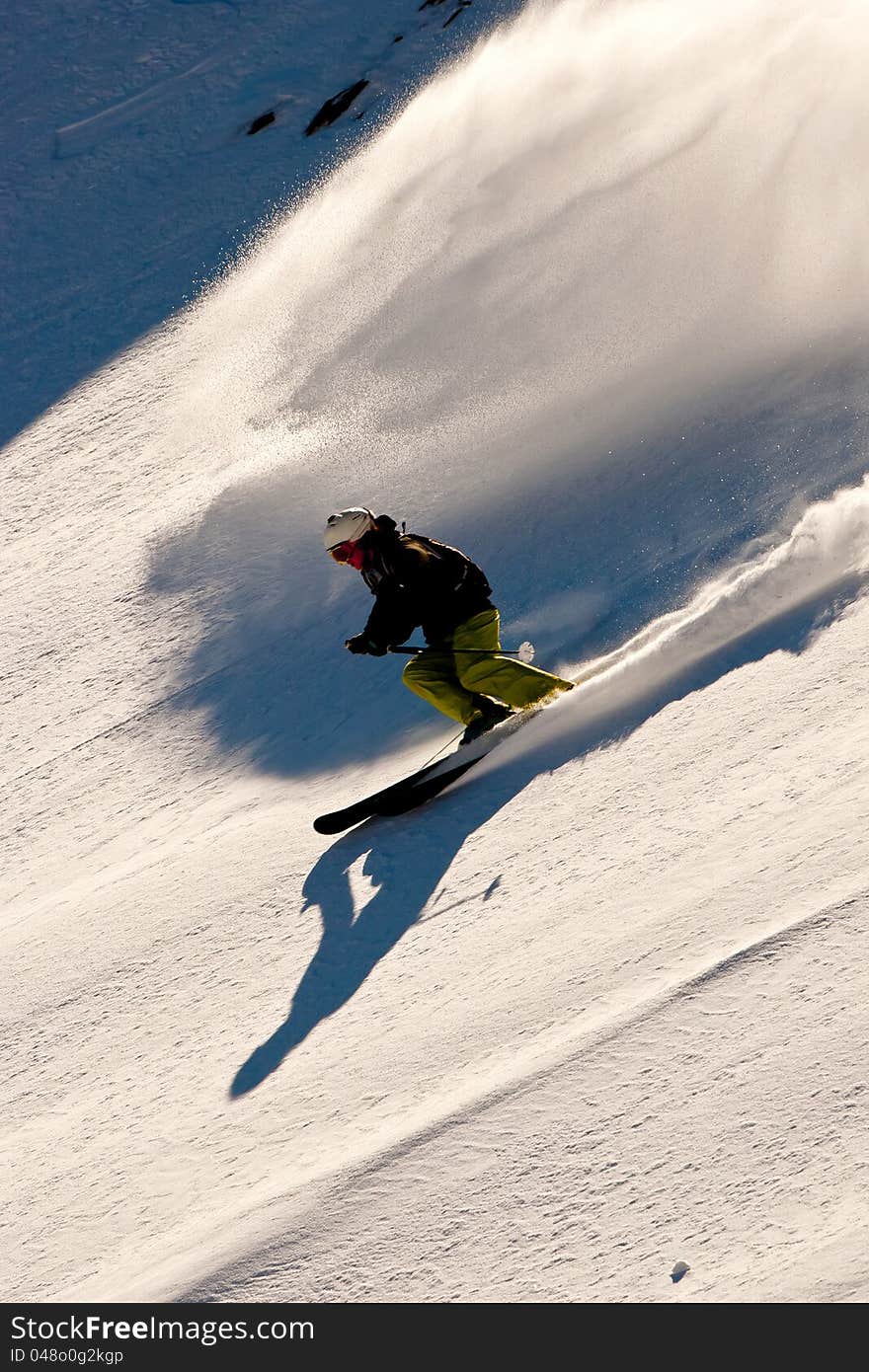 Lady freerider in Caucasus mountains. Lady freerider in Caucasus mountains