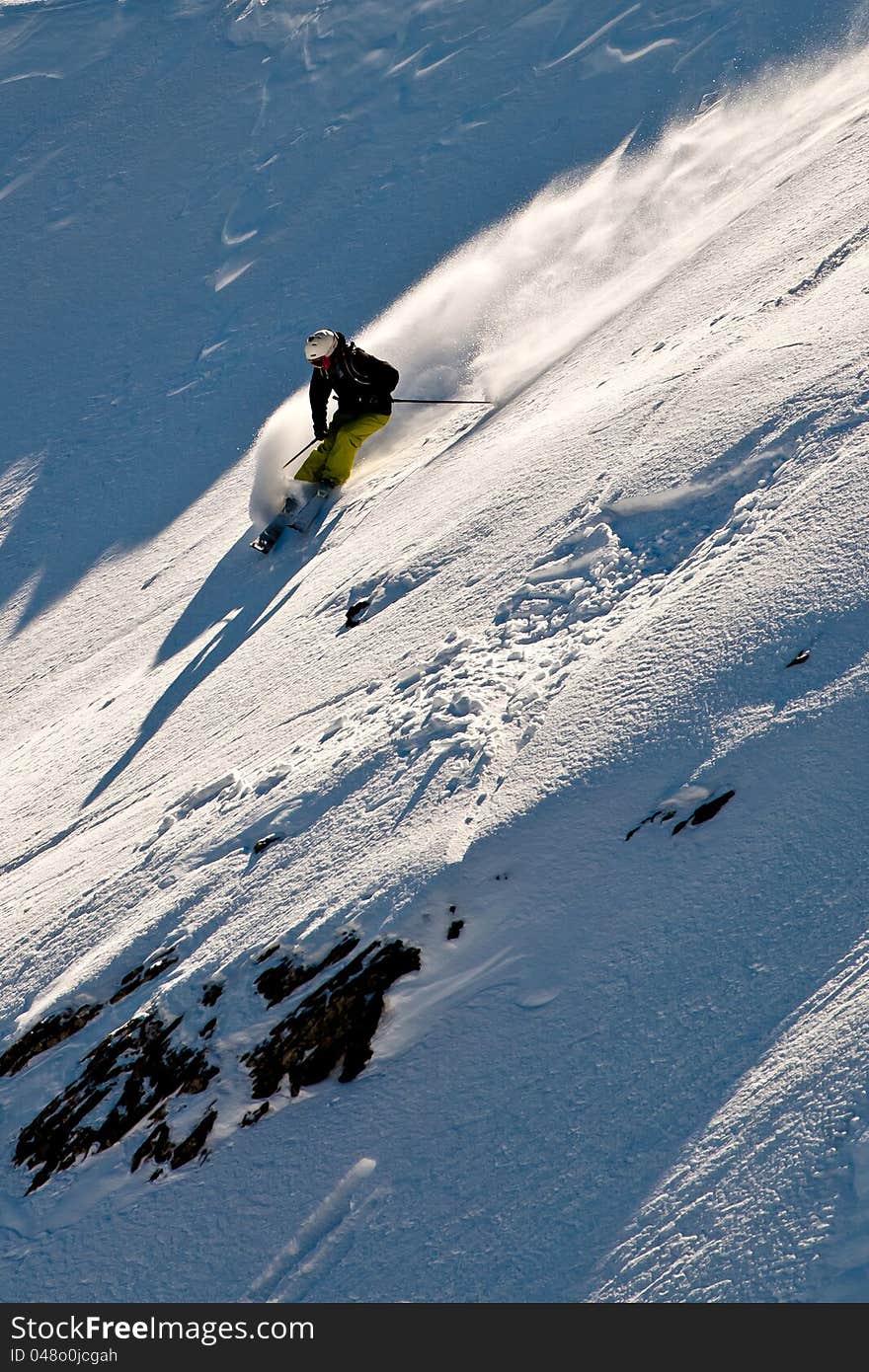 Lady freerider in Caucasus mountains. Lady freerider in Caucasus mountains