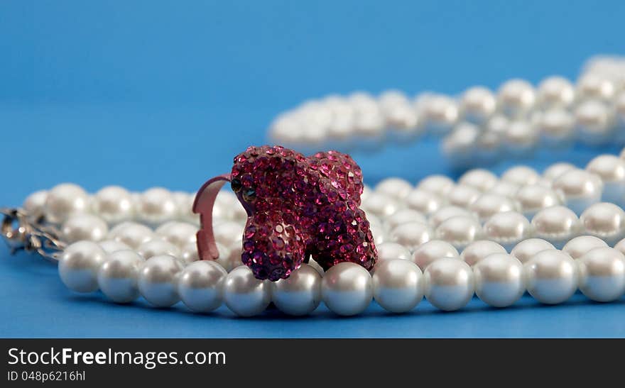 Picture of a Red ring on pearls