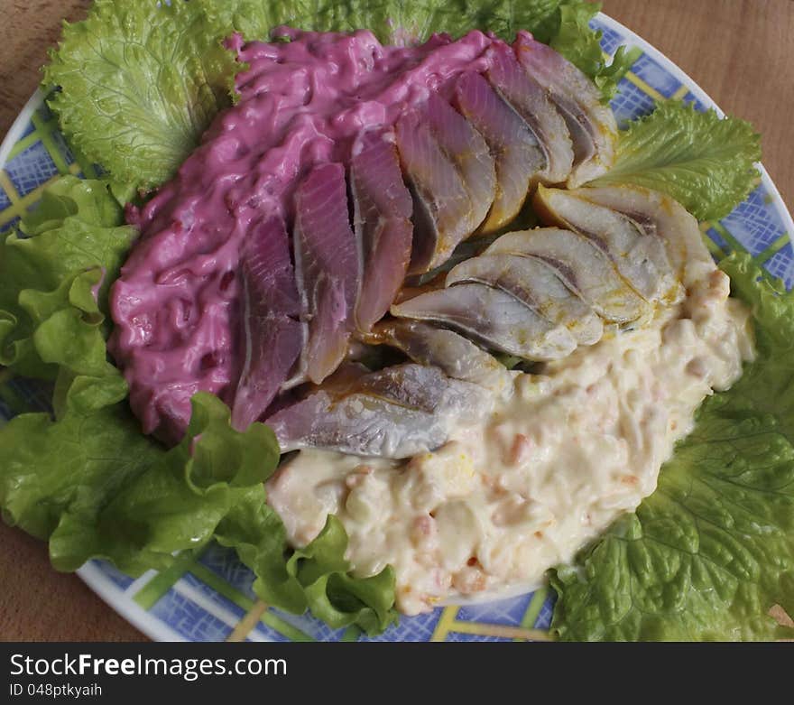 Herring fillet with vegetables in mayonnaise sauce