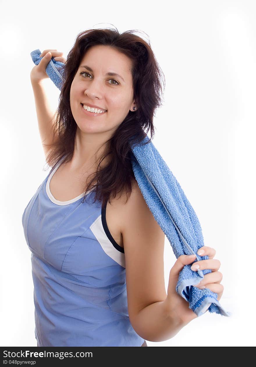 Cheerful woman with a towel workout pleased