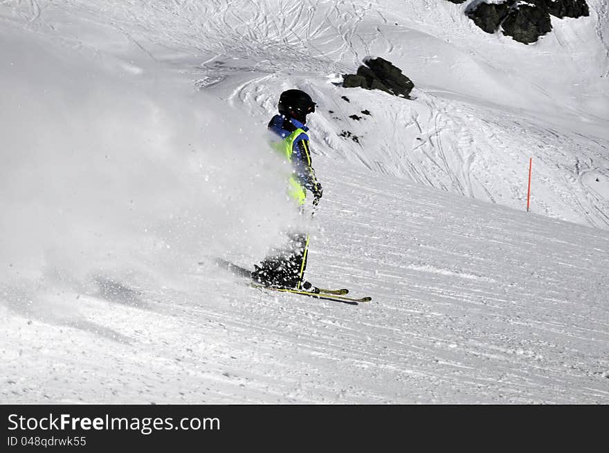 Winter sports: skier on ski slope. Winter sports: skier on ski slope