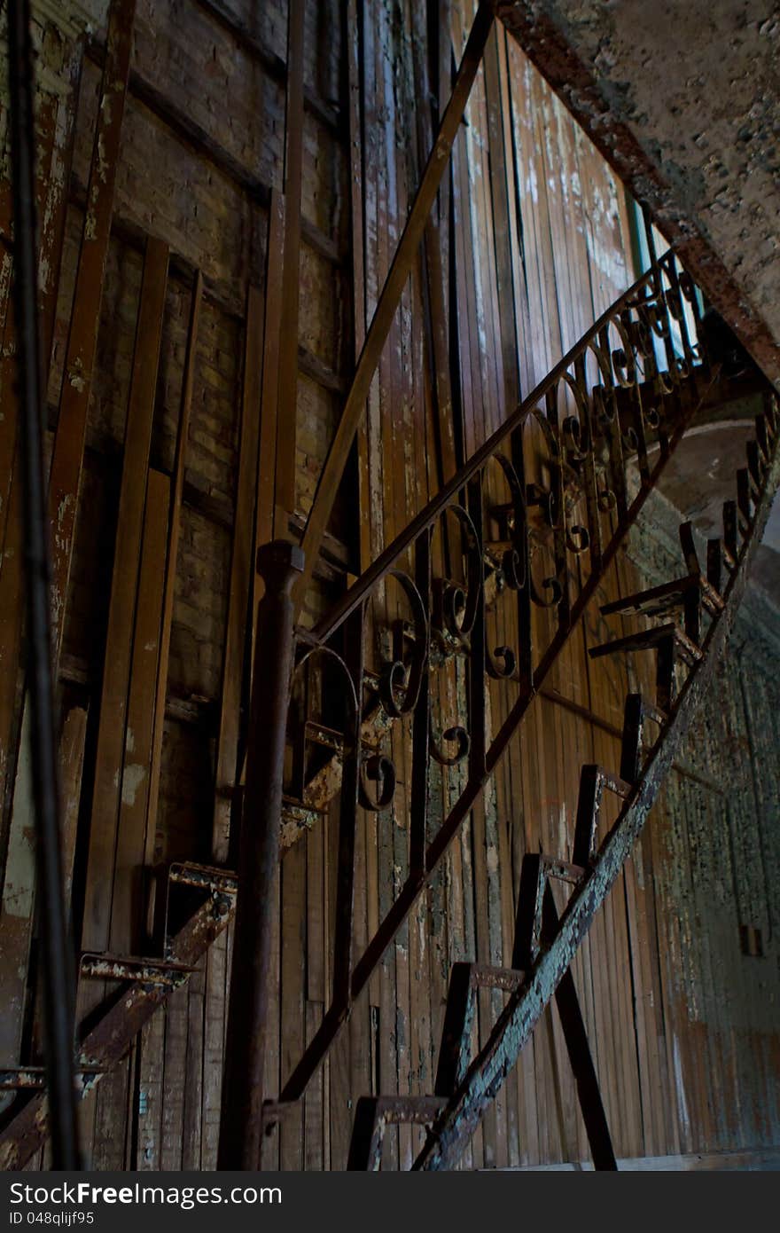 This staircase with no stairs leads up to the Warden's Office in the abandoned prison facility in New Jersey. Essex County Prison was built in 1837, and abandoned in 1970 when the new prison was built. In 1991 some scenes from MalcomX were shot here, and a fire further destroyed the facility in 2001. This staircase with no stairs leads up to the Warden's Office in the abandoned prison facility in New Jersey. Essex County Prison was built in 1837, and abandoned in 1970 when the new prison was built. In 1991 some scenes from MalcomX were shot here, and a fire further destroyed the facility in 2001.