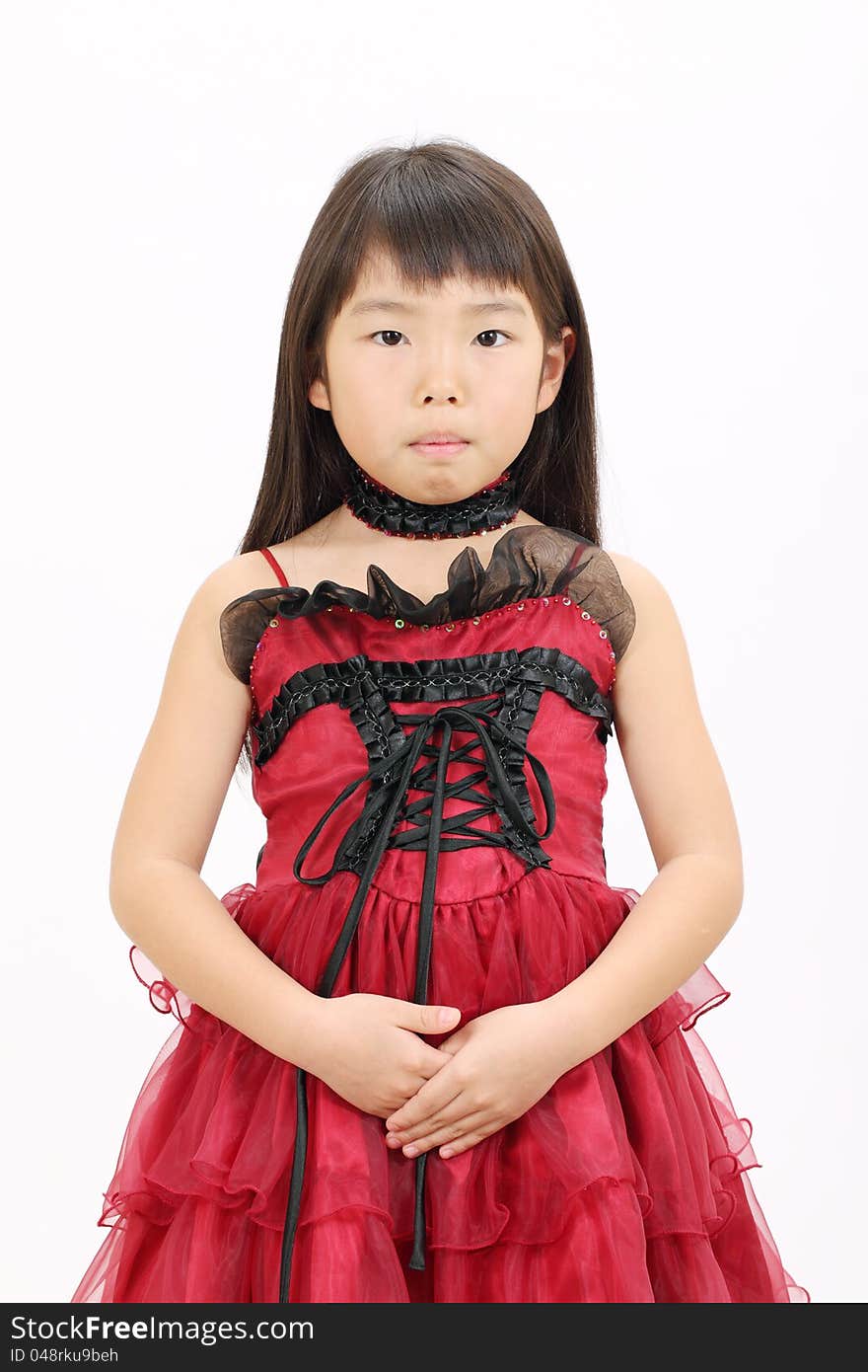 Little asian girl with hands crossed