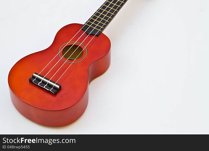 Ukulele on white background. Ukulele on white background