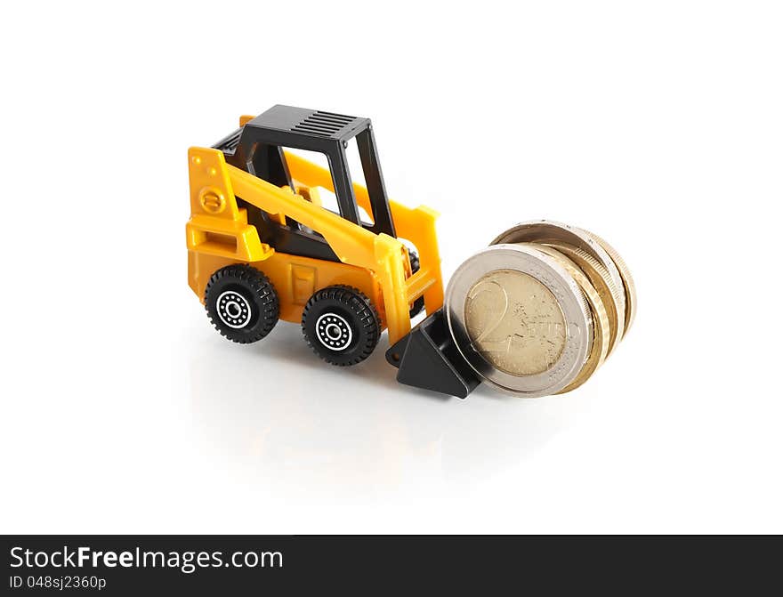 Business concept. Toy forklift truck with European coins on white background. Business concept. Toy forklift truck with European coins on white background