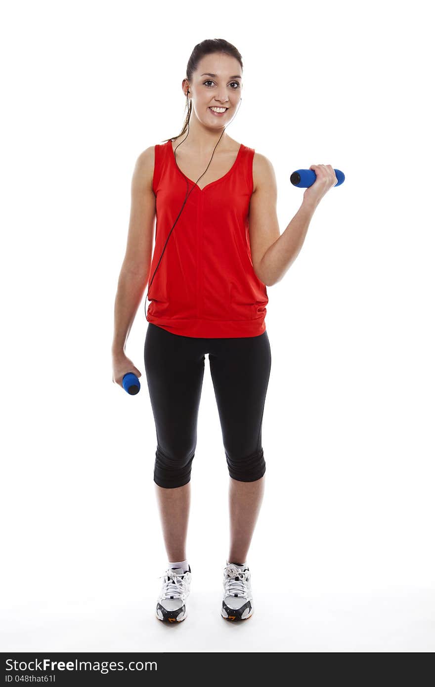 Young fit woman exercising with weights