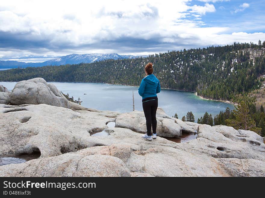 Views of Lake Tahoe in California with crystal clear water, snow on the ground, and mountains in the background. Views of Lake Tahoe in California with crystal clear water, snow on the ground, and mountains in the background.