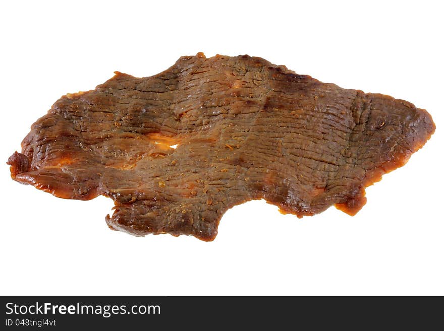 A piece of dried salty Beef Jerky