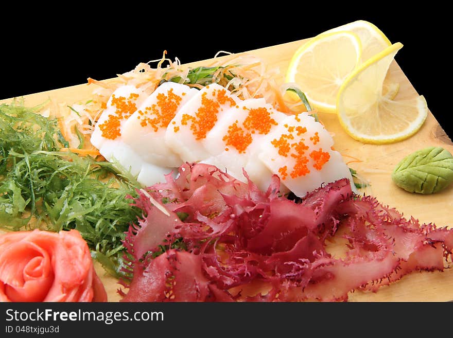 Sashimi hotate on a board