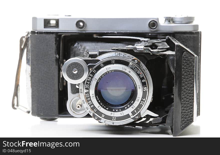 Old camera on white background