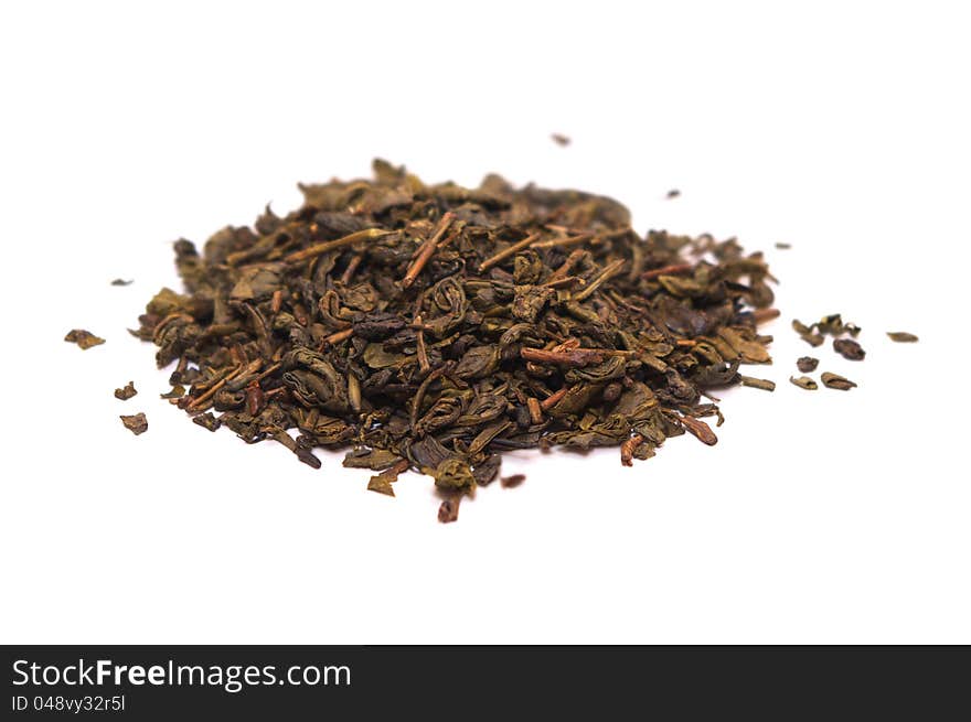 Photo of the Dry green tea on white background